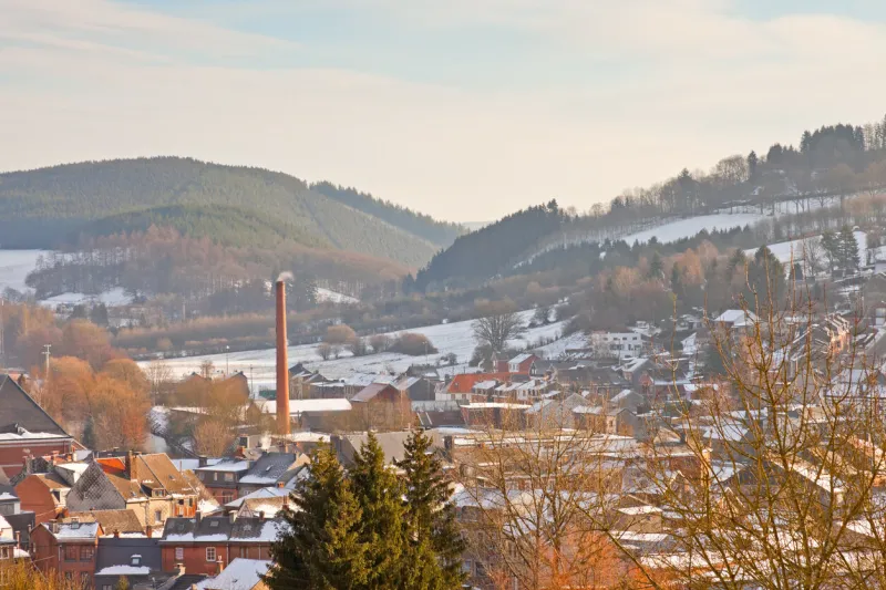 winter landscape of village in snow valley