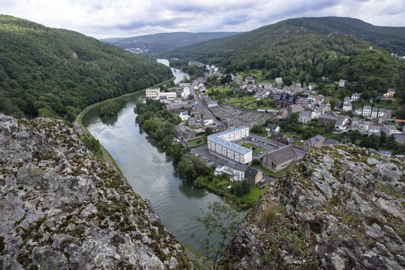 aerial view of a town in the ardennes crossed by the meuse river in france