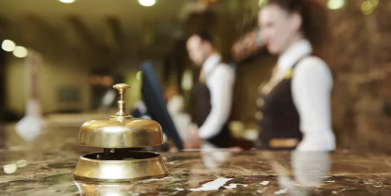 modern luxury hotel reception counter desk with bell