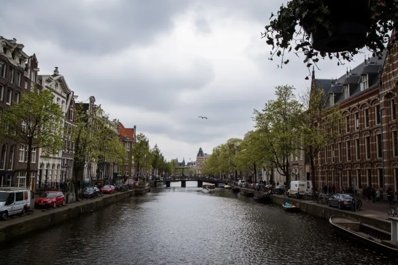 view of a canal in amsterdam on april 12, 2017 (photo by aurore belot   afp)