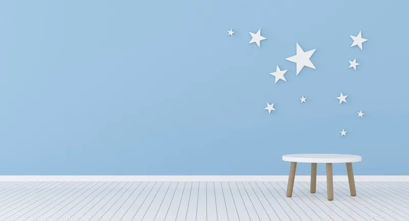 view of kids living room with round side table on blue wall with stars background 3d rendering