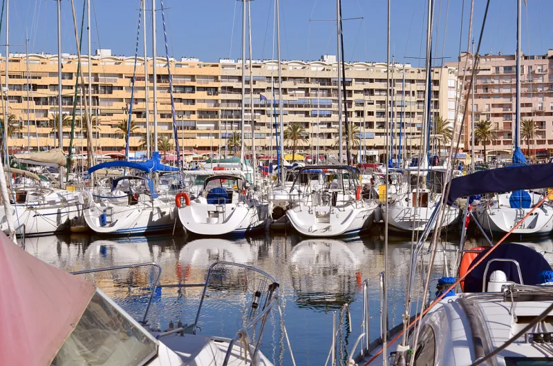 marina and buildings of saint-cyprien, commune in the pyrénées-orientales department, languedoc-roussillon region, in southern france