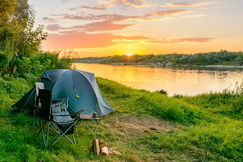 camping tent in a camping in a forest by the oka river russia