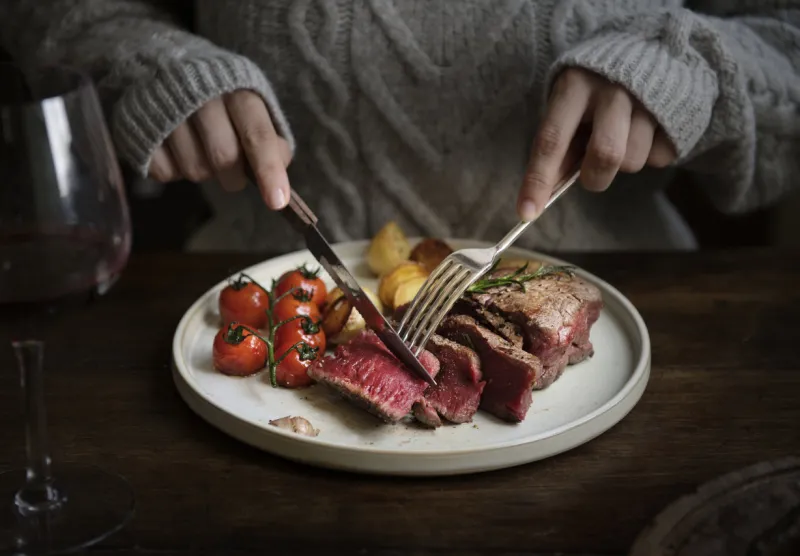 close up of a cutting a fillet steak food photography recipe idea
