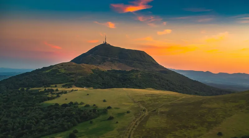 the puy-de-dôme mountain in auvergne in clermont-ferrand at sunset