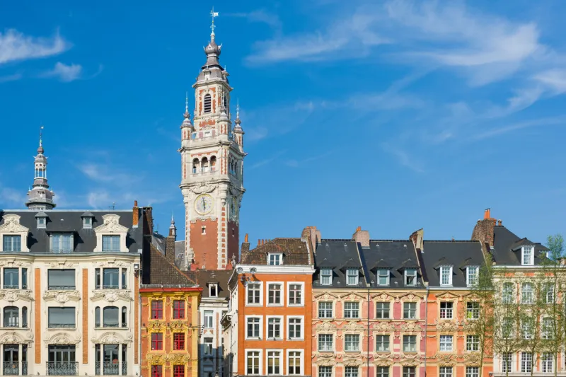 view on chamber of commerce in lille under the blue sky