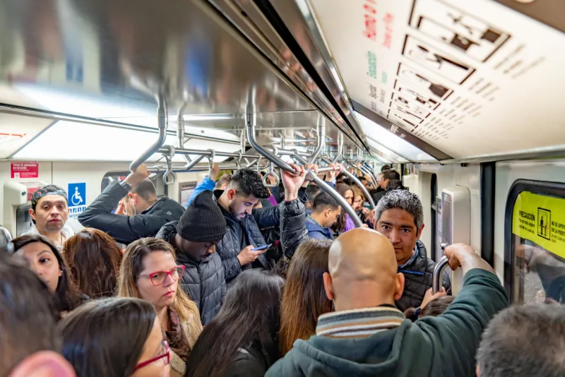 santiago, chile - october 12, 2018  people traveling in a busy subway train in santiago, chile