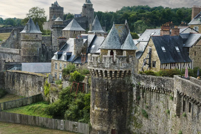 view of the medieval wall and castle of the french town of fougeres