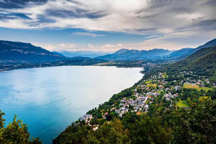 elevated viewpoint over small french village of bourdeau on the edge of lake bourget near aix les bains and chambery city in alps mountains