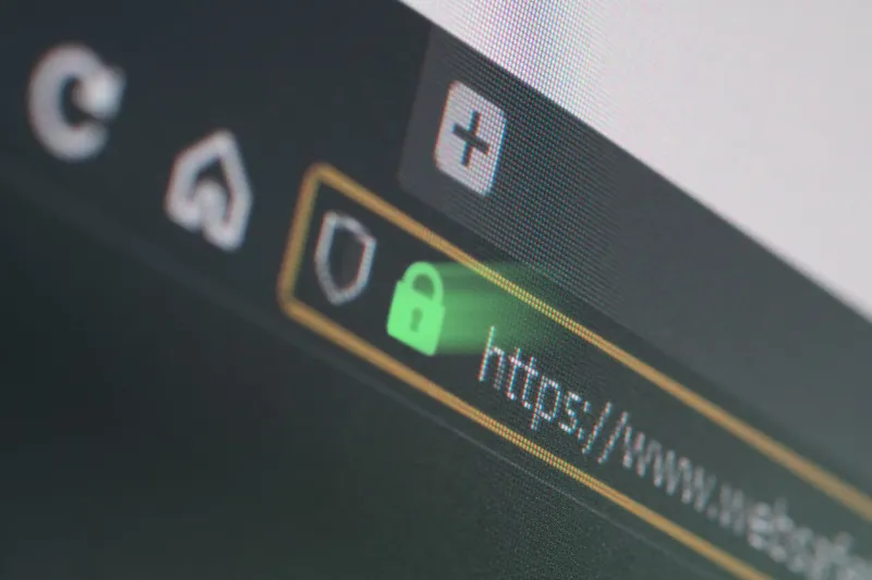 dark web browser close-up on lcd screen with shallow focus, light shining through https padlock internet security, ssl certificate, cybersecurity, search engine and web browser concepts