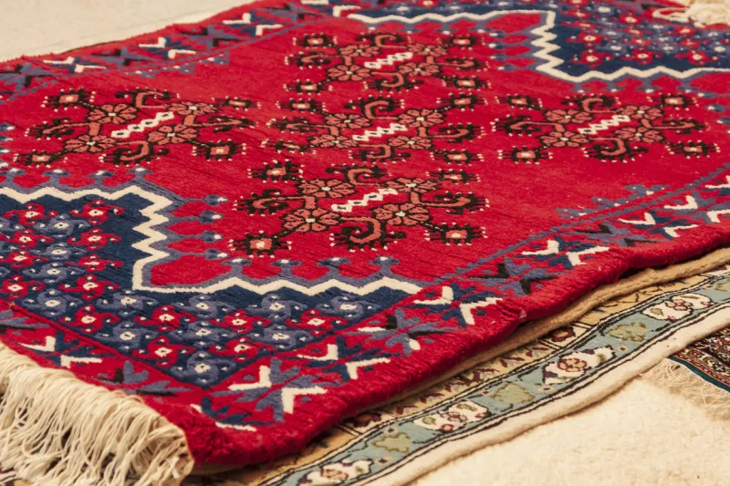 beautiful red carpet with a pattern in a market in tunisia