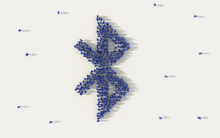 large group of people forming bluetooth symbol in social media and community concept on white background 3d sign of crowd illustration from above gathered together