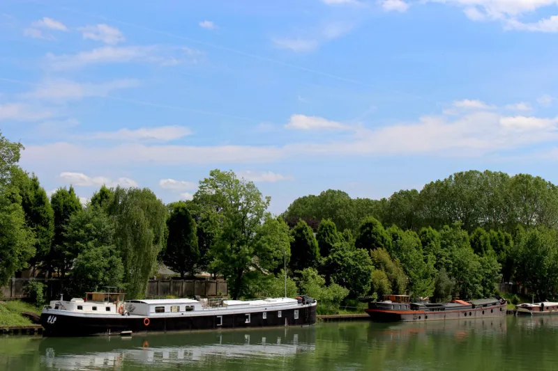this is a photograph of a barge on the waterfront