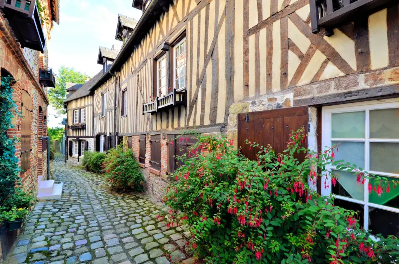 picturesque timbered buildings in the normandy town of honfleur, france