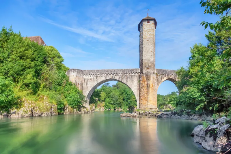 orthez, france view of old stone roman bridge over ousse river