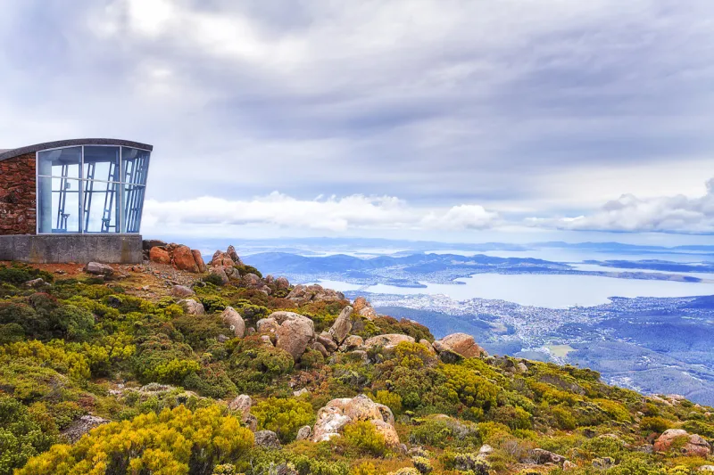 top of mt wellington over hobart city - the capital of tasmania in australia windy lookout observation platform and pavilion overlooking derwent river valley