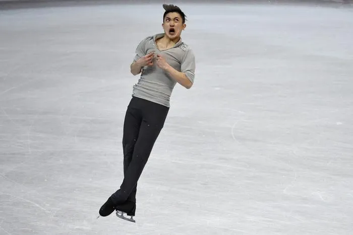 han yan of china performs in the men's short program at the isu four continents figure skating championships in taipei on january 25, 2018   afp photo   anthony wallace