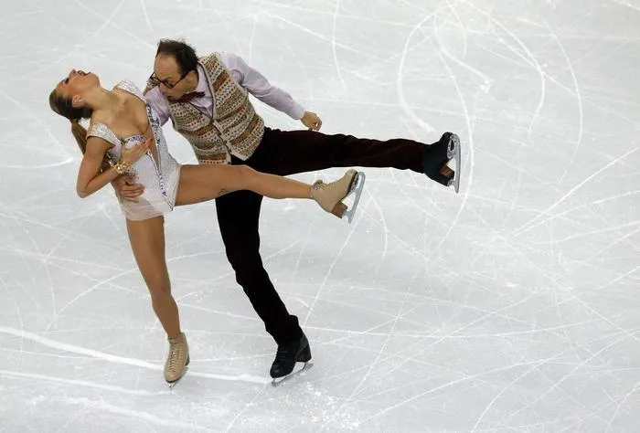 germany's alexander gazsi and germany's nelli zhiganshina perform in the figure skating ice dance short dance at the iceberg skating palace during the sochi winter olympics on february 16, 2014 afp photo   adrian dennis   afp photo   adrian dennis