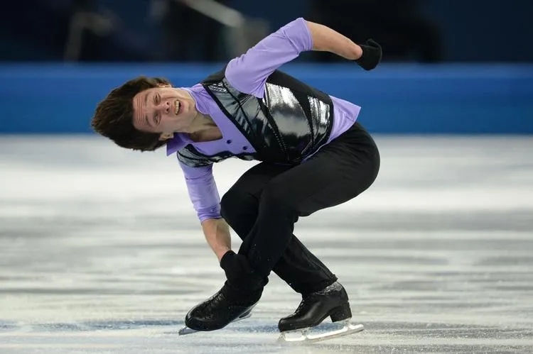 israel's alexei bychenko performs during the men's figure skating short program at the iceberg skating palace during the sochi winter olympics on february 13, 2014 afp photo   yuri kadobnov   afp photo   yuri kadobnov