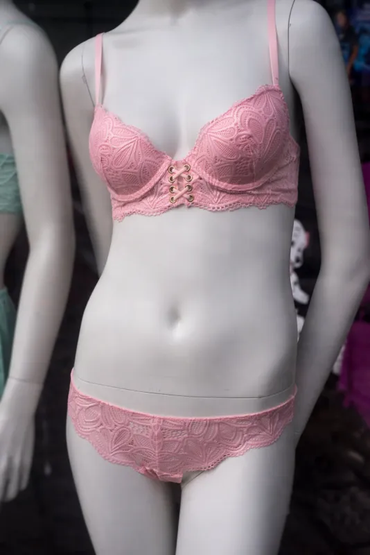 closeup of pink underwear on mannequin in a fashion store showroom