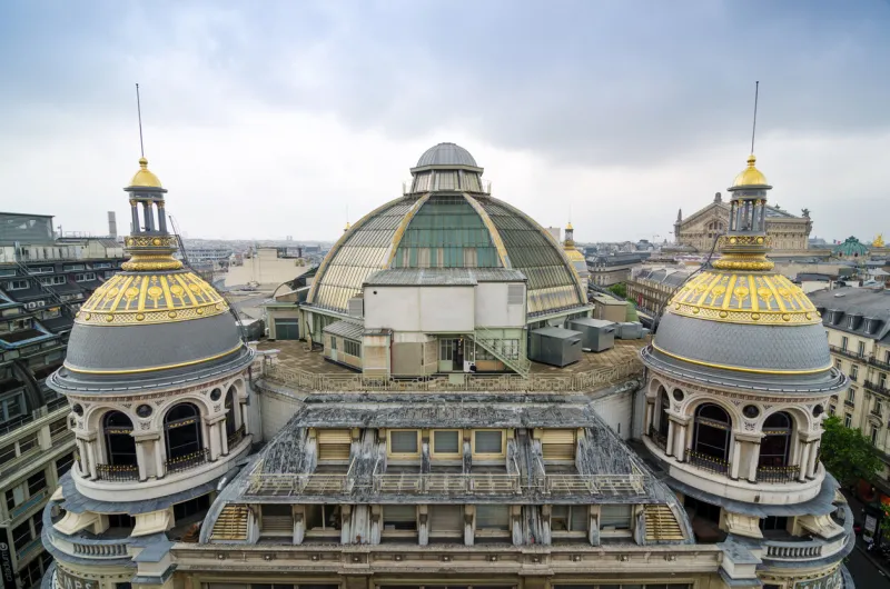 paris, france - may 15, 2015  rooftop of printemps in paris, france the largest beauty department store in the world with 45000 square meters of shopping printemps facade (registered as historic monument)