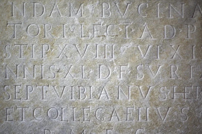 ancient latin words on marble tablet