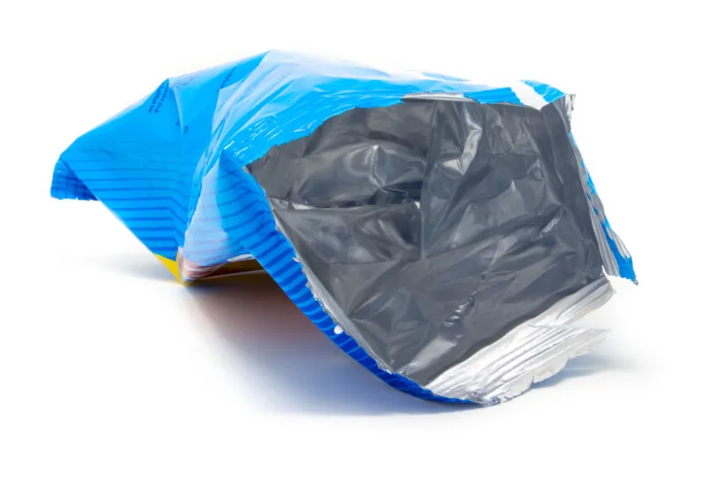 empty potato chips bag, isolated on white background