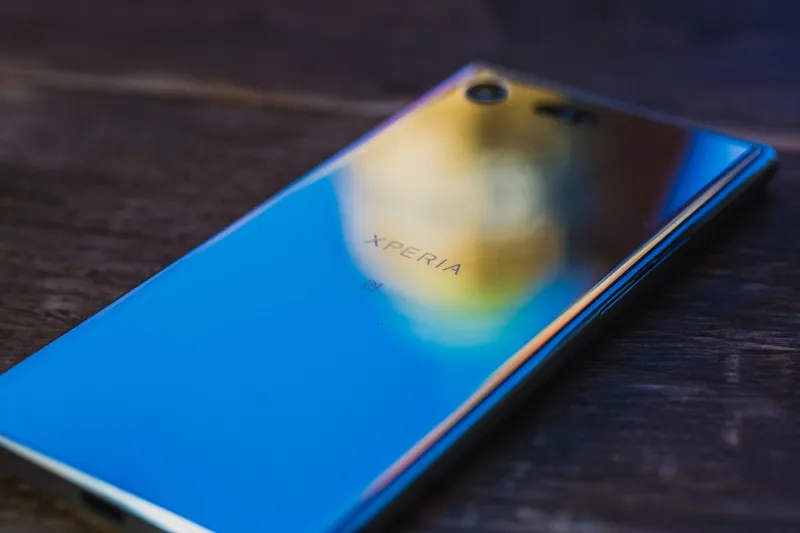 london, united kingdom – november 4th 2017  the back of sony xperia xz premium smartphone on the wooden table