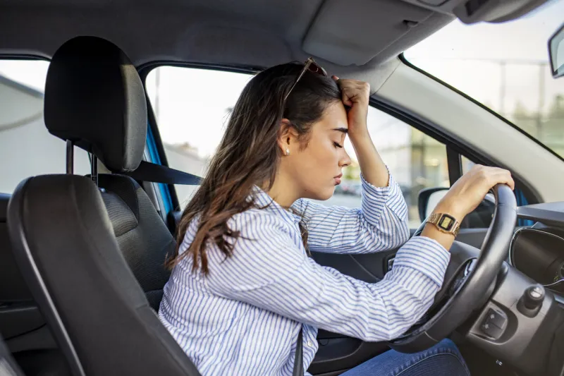 stressed woman drive car feeling sad and angry girl tired, fatigue mental on car sleepy and drunk female hangover illegal law driver license driving when tired and do not drive drowsy concept