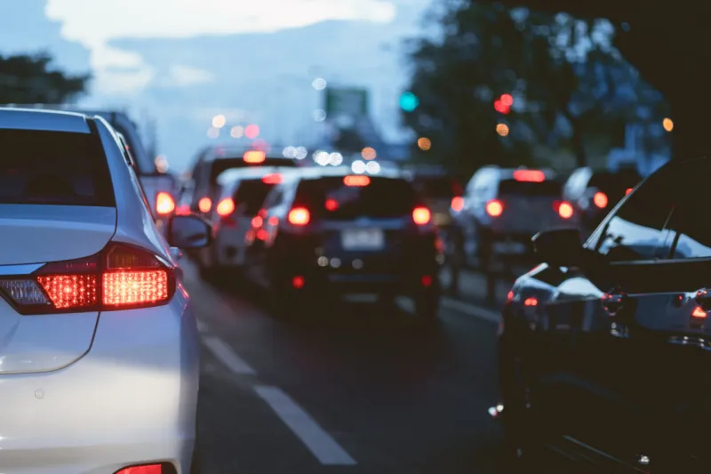 traffic jam many cars stuck on road in evening time off working hours