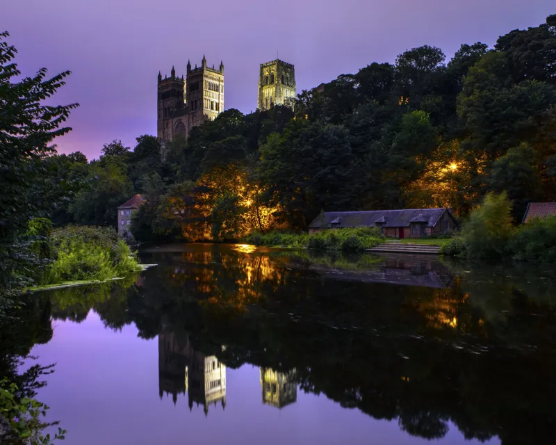 durham, uk - august 25th 2021  a view of the stunning durham cathedral at dusk, in the city of durham, uk
