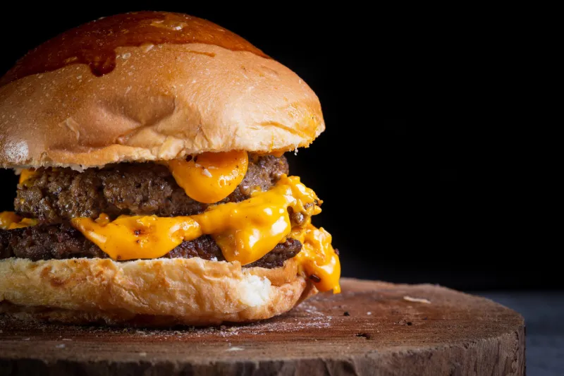 two smash burger with cheddar cheese and garlic sauce r