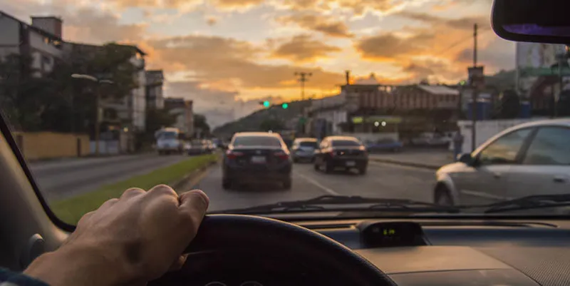 driving at sunset view from the driver angle,car focusinside