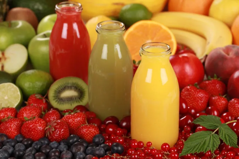 fresh fruit juices made from red, green and orange fruits