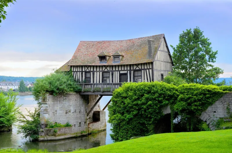 old mill house on bridge, seine river, vernon, normandy, france