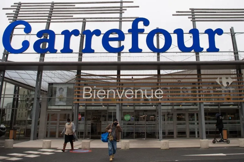 france economy retail carrefour couche tard