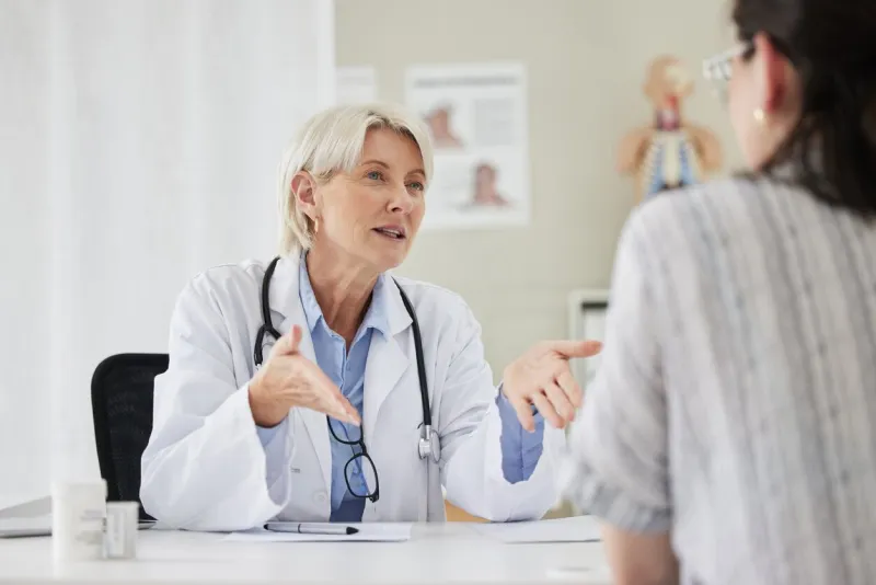 shot of a mature doctor having a consultation with a patient