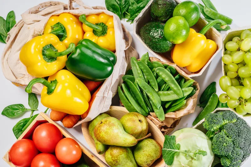 fresh green organic vegetables with eco shopping bag top view, flat lay healthy eating and lifestyle concept home delivery concept