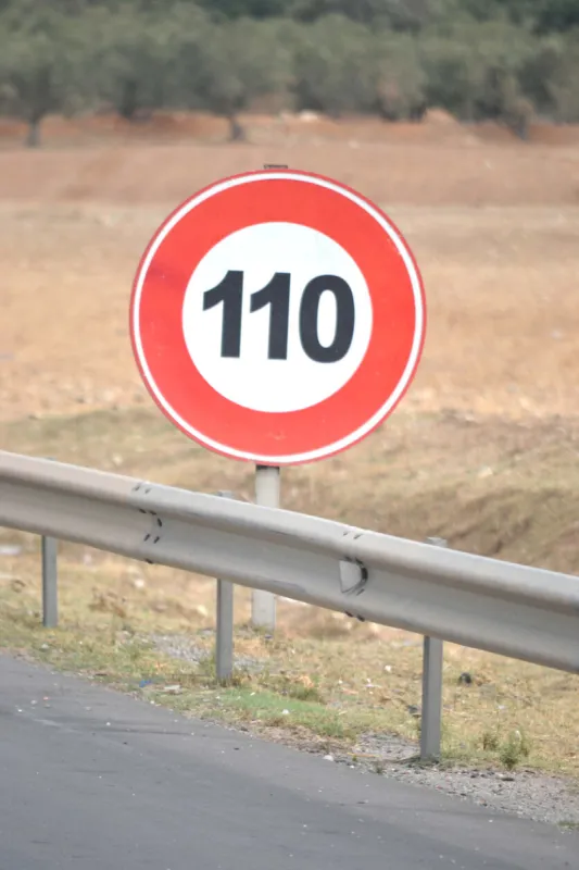 speed limit sign on a highway