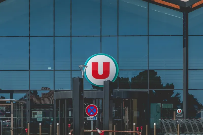bretignolles sur mer, france - july 31, 2016  view of the entrance of a super u store, a supermarket dependent on a cooperative of french retailers