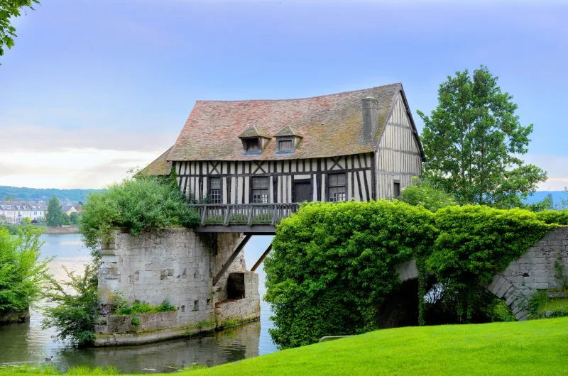 old mill house on bridge, seine river, vernon, normandy, france