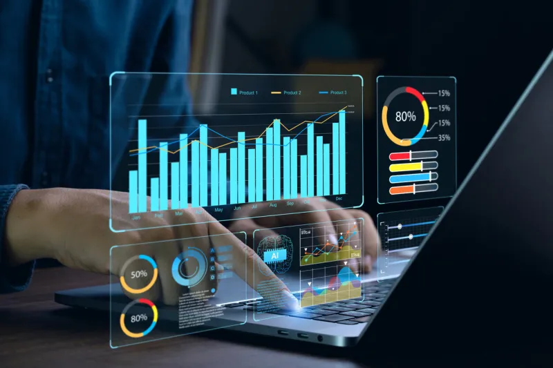 businessman works on laptop showing business analytics dashboard with charts, metrics, and kpi to analyze performance and create insight reports for operations management data analysis conceptai