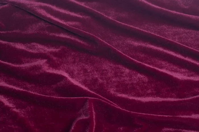 red velvet fabric background texture close up