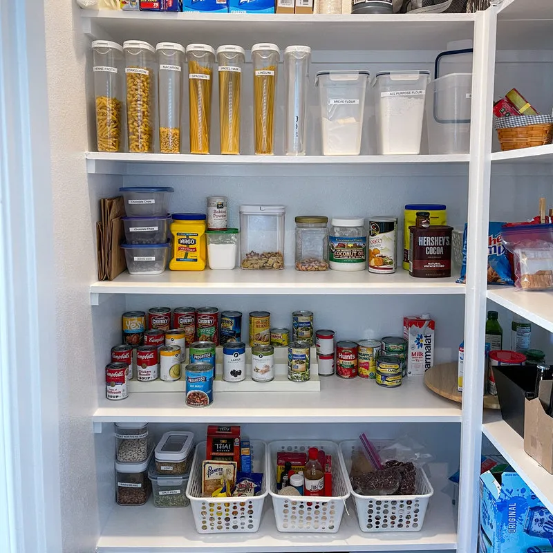 orlando,fl usa - january10, 2021  a home pantry that is organized with various products in put away in a tidy manner