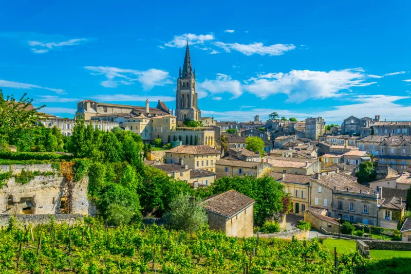 aerial view of french village saint emilion dominated by spire of the monolithic church