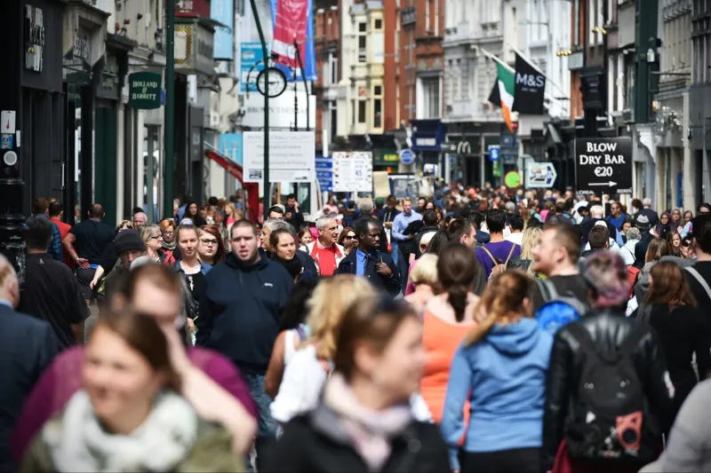 dublin, ireland - july 22, 2015  crowds of people walk on grafton street the street is a main tourist attraction in the irish capital, renowned for its lively atmosphere and shops