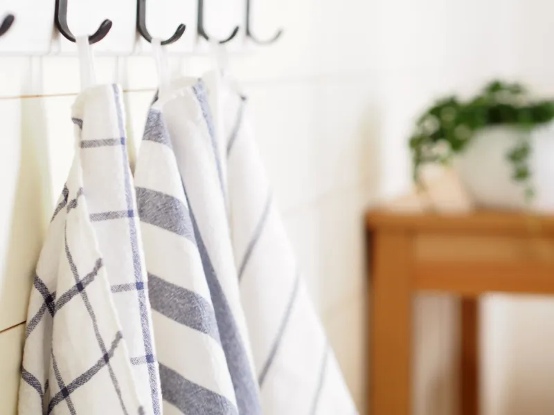 kitchen towels hanging on a hooks