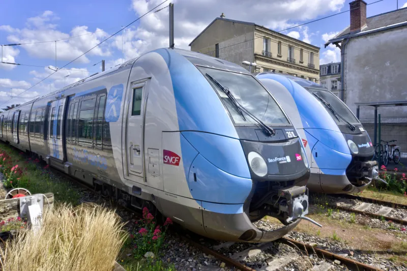versailles, france - may 28, 2022  two trains at versailles rive droite railway station