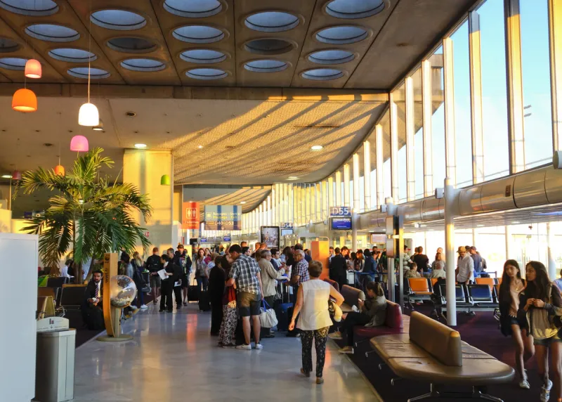 paris, france – june 30, 2015  the passengers waiting for the plane in the terminal board at charles de gaulle, airport, paris