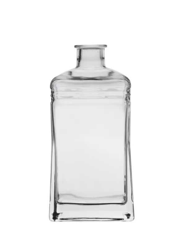 empty glass bottle of rectangular shape isolated on a white background